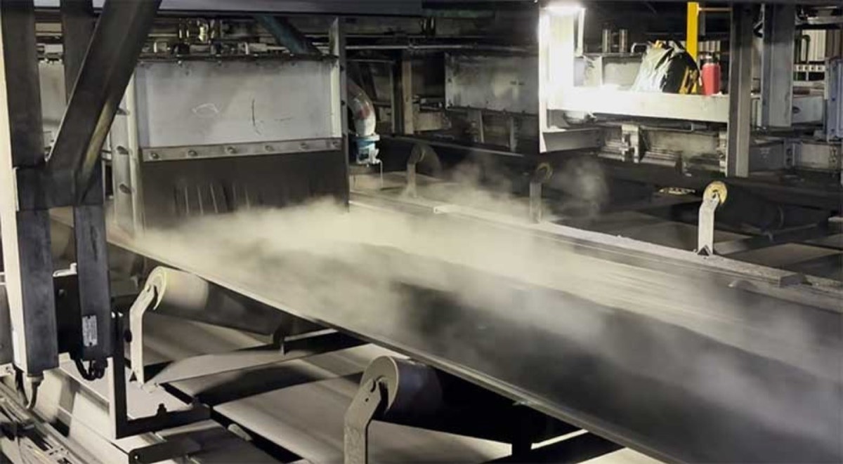 Dry fog dust suppression installed on a conveyor transfer point