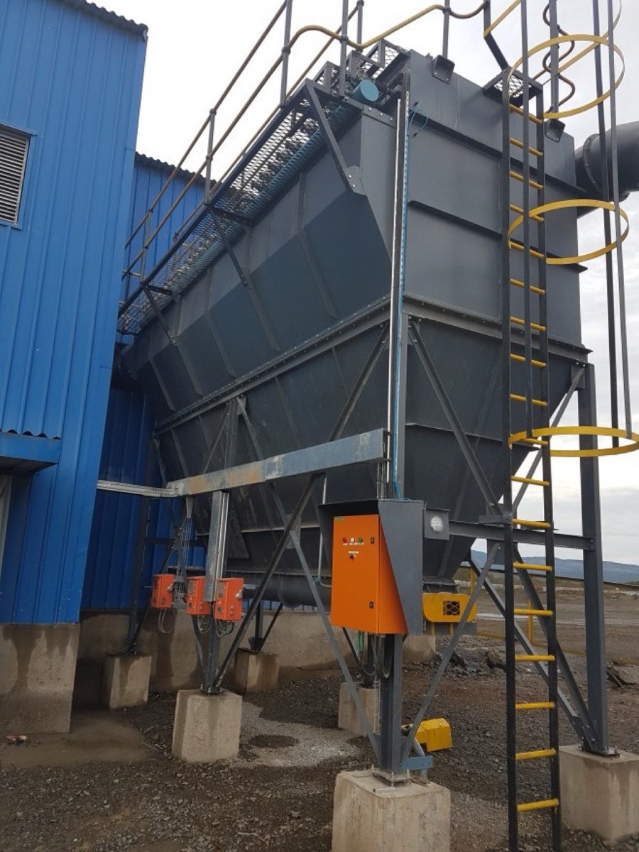 Side view of the Mamba Cement primary crusher bag filter with access ladder