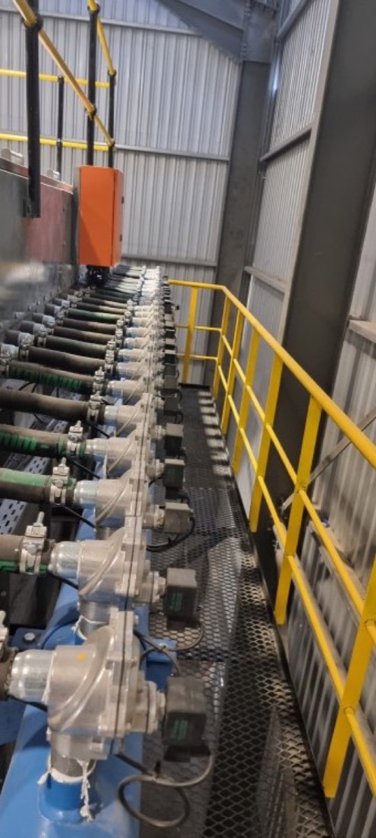 Row of reverse pulse valves on the Mamba Cement packing plant filter